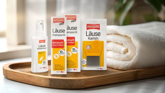 Skincare jar and dropper bottles mockup on a bamboo tray with towels in natural light, ideal for organic skincare branding, product promotions, or spa advertisements